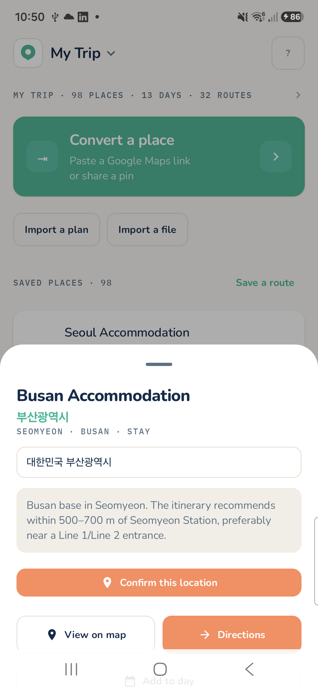 Maptinerary place detail sheet with a confirm-location prompt